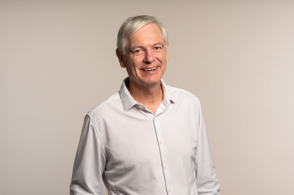 Dr Wolfgang Brysch, co-founder of iuLabs, man with grey hair wearing white shirt