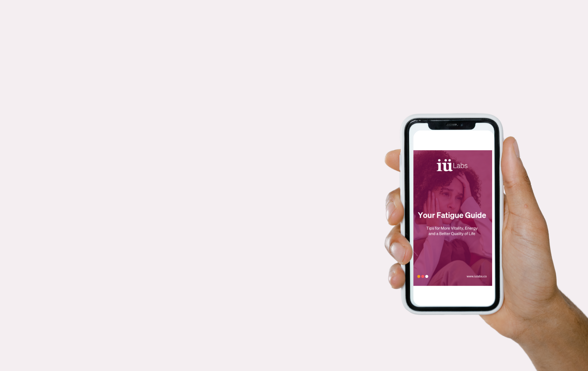 Hand holding phone with iuLabs fatigue guide on the phone and a light purple background, fatigue guide tips on how to manage fatigue and fight fatigue to feel better, by scientist Dr Wolfgang Brysch